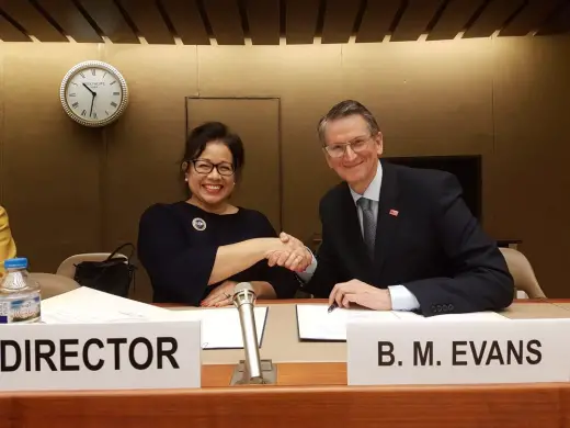 Ivonne Higuero, Director of Forest, Land and Housing Division, UNECE and Professor Brian Evans shake hands