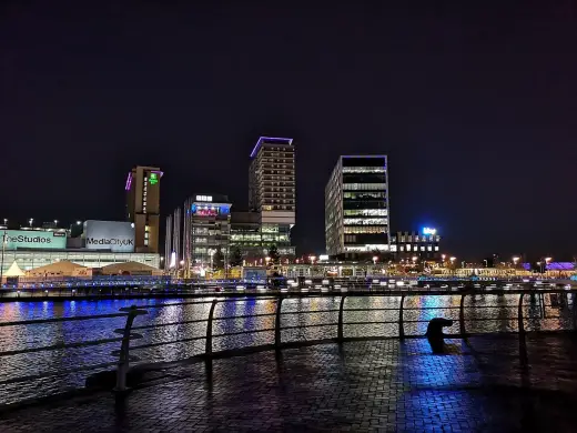 Salford buildings at night docks - Lark Hill Primary School modular classroom extension