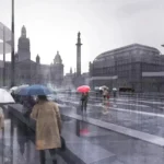 George Square Glasgow people in the rain umbrellas