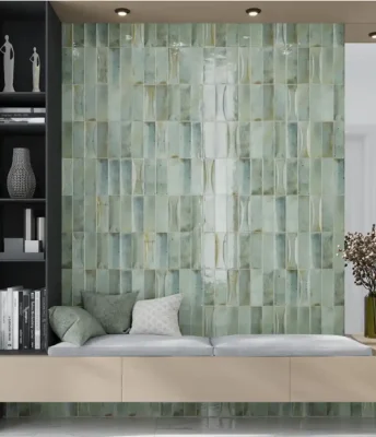 A bedroom with sage-green subtile backdrop and couch